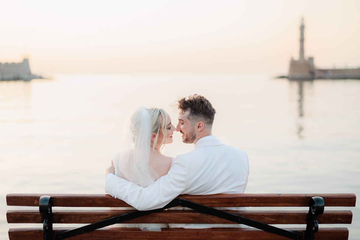 newly weds in front of Chania Lighthouse