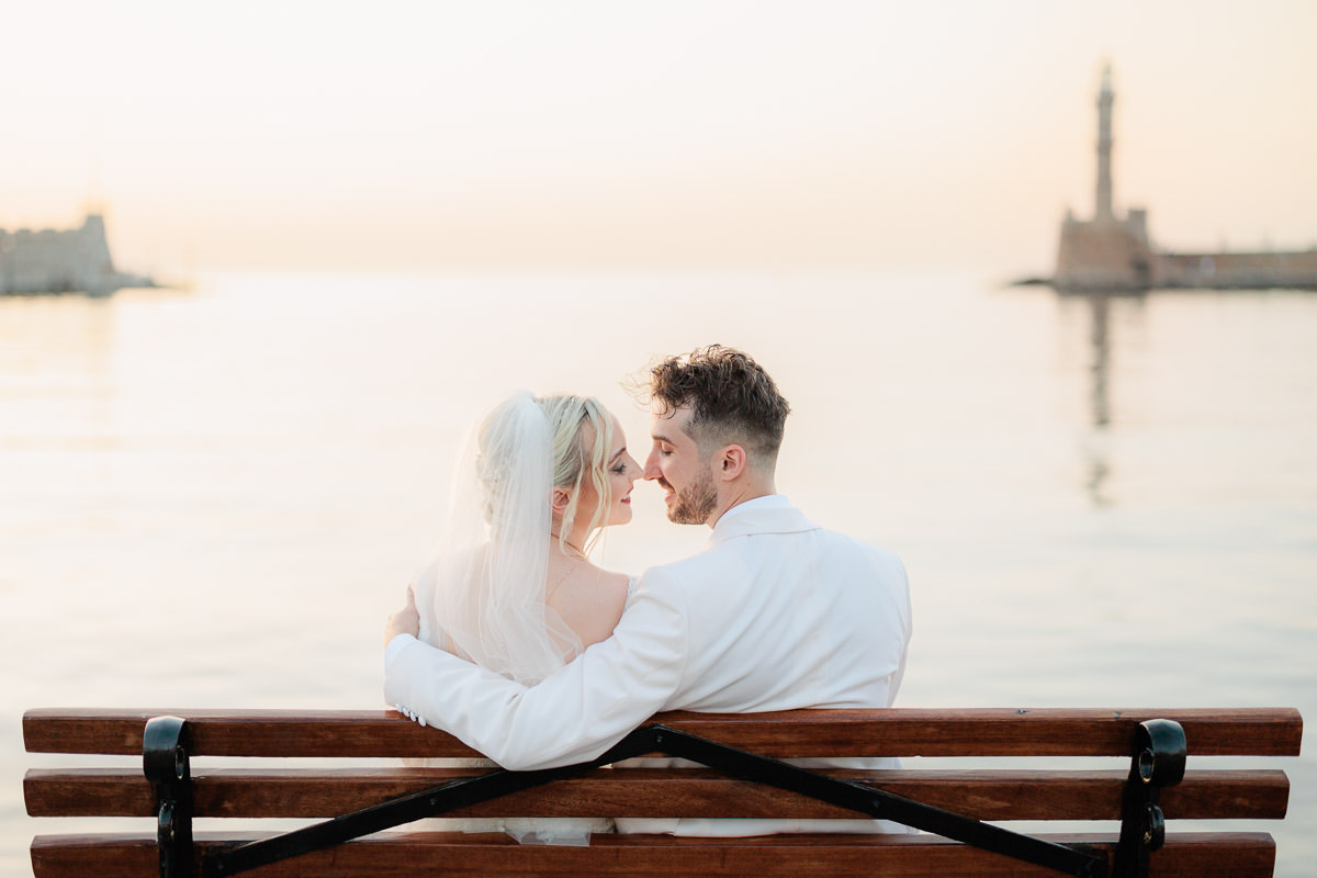 newly weds in front of Chania Lighthouse