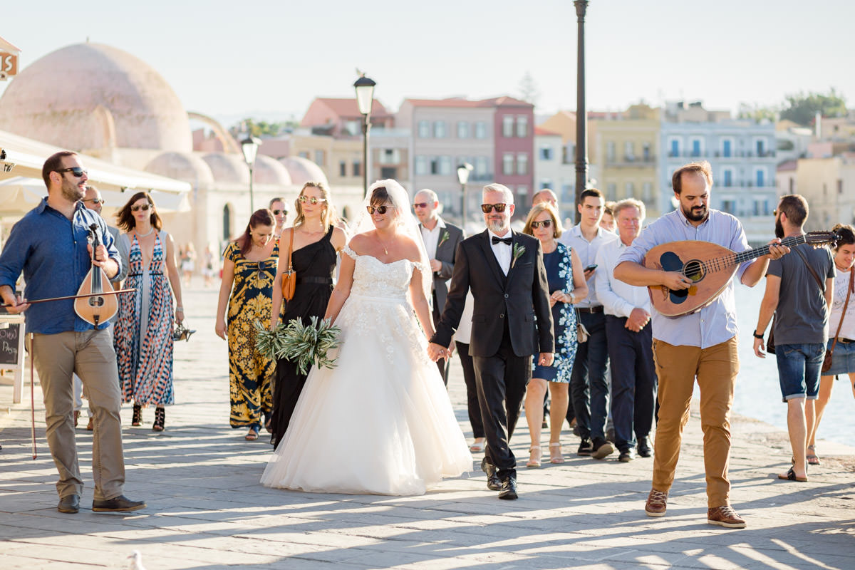 wedding parade in old town of Chania and old harbor