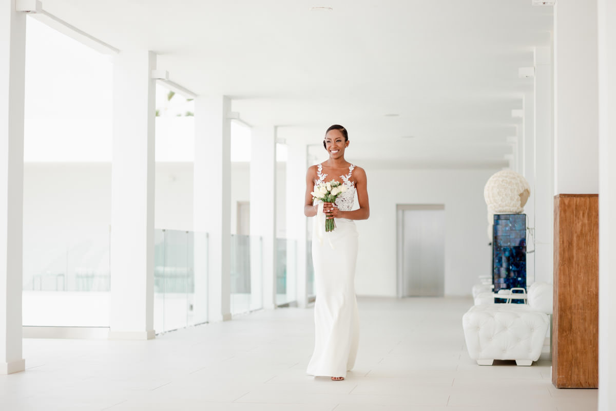 bride walking down the aisle in Grecotel White Palace