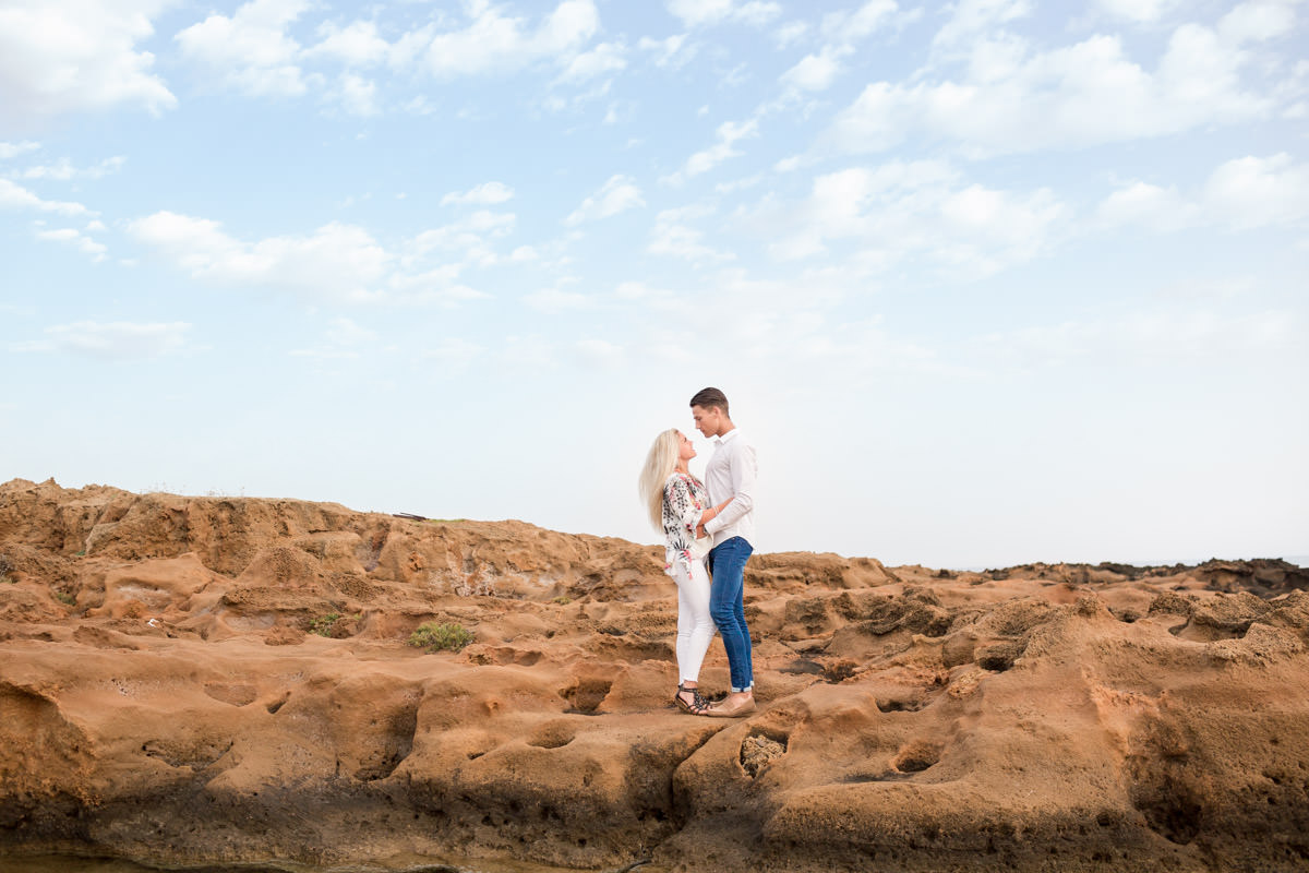 looking each other in a rocky landscape in Crete