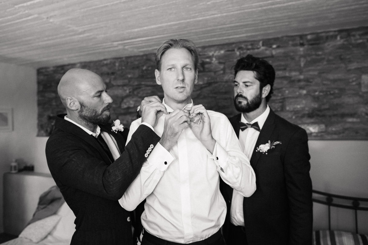 groom and groomsmen getting ready