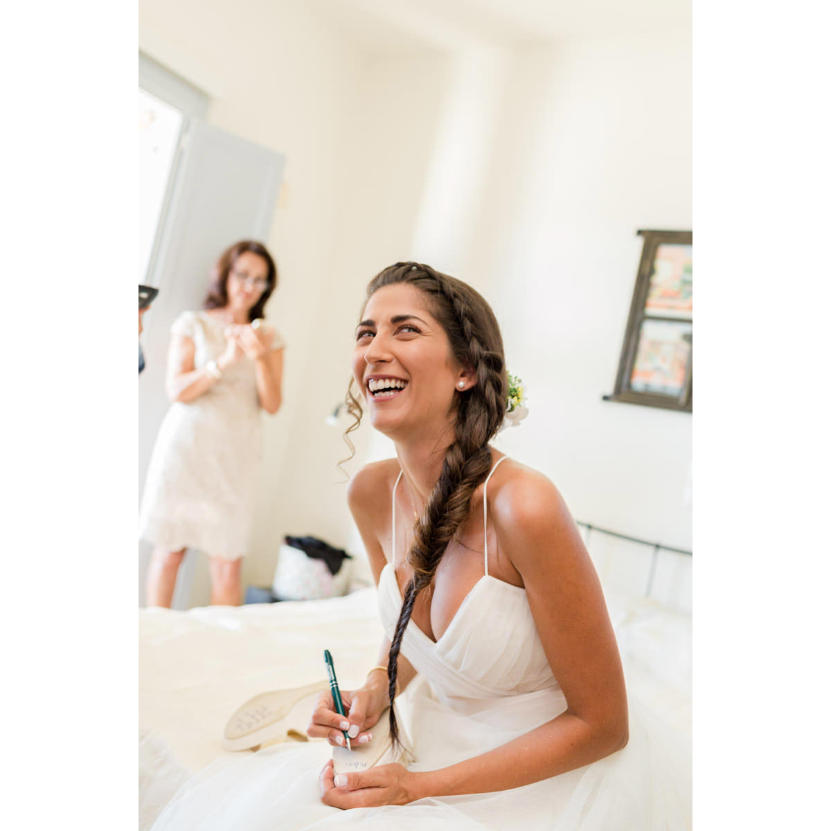 happy bride getting ready with friends