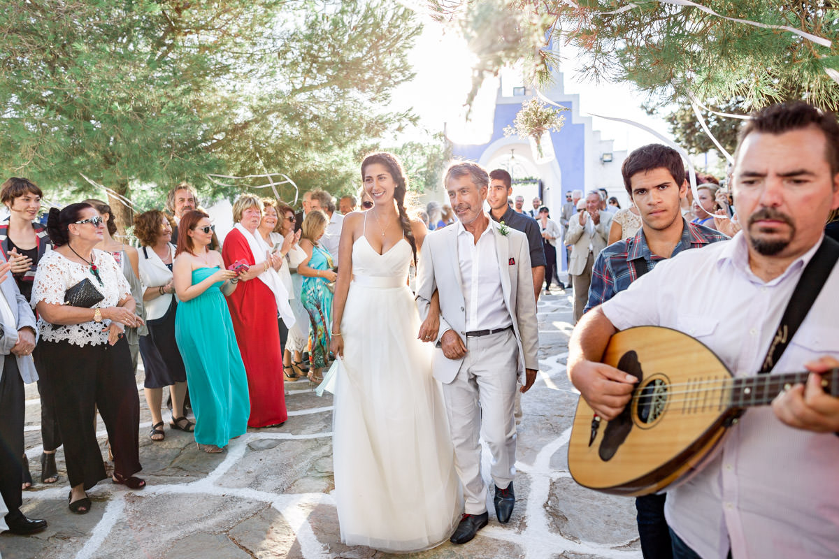 bride walking down the aisle in Kastriani in Kea island