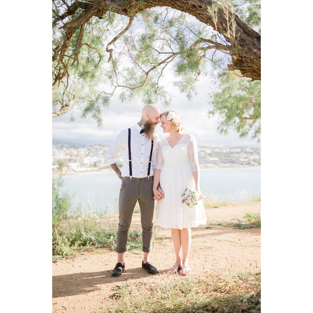 couple in love under the trees in Agioi Apostoloi in Chania