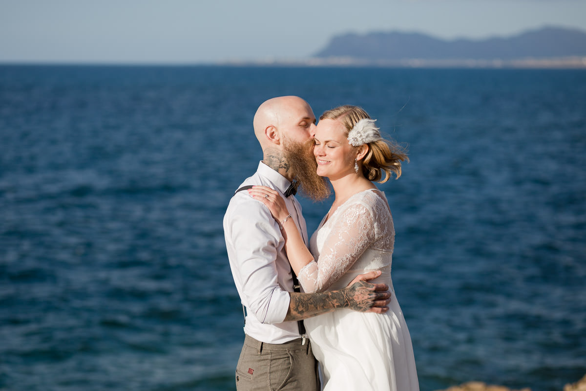 groom kissing the bride