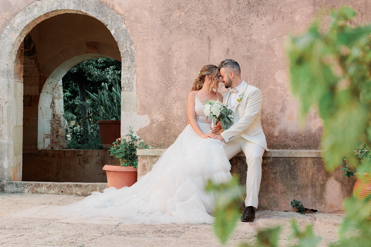 wedding portrait of two people in love in a monastery in Chania