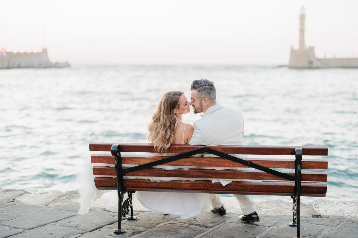 relaxed moments of newlyweds in the old harbor of Chania