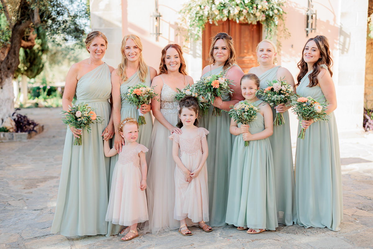 the bridesmaids holding a wedding bouquet