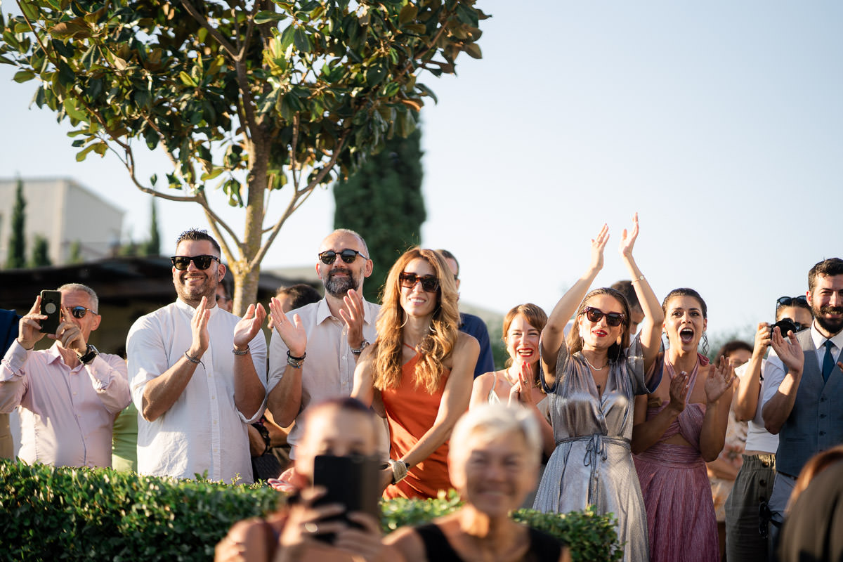 guests are so happy watching the bride arriving